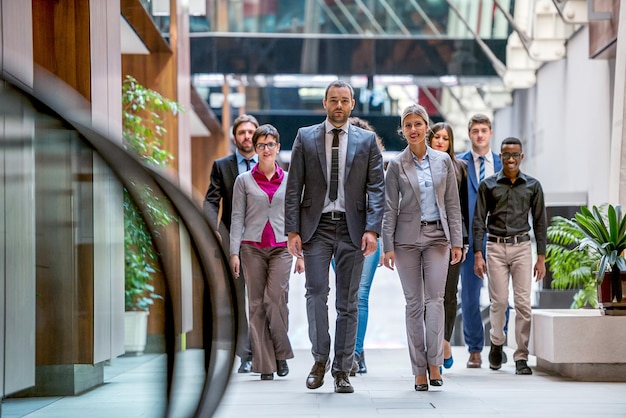 young multi ethnic business people group walking standing and top view