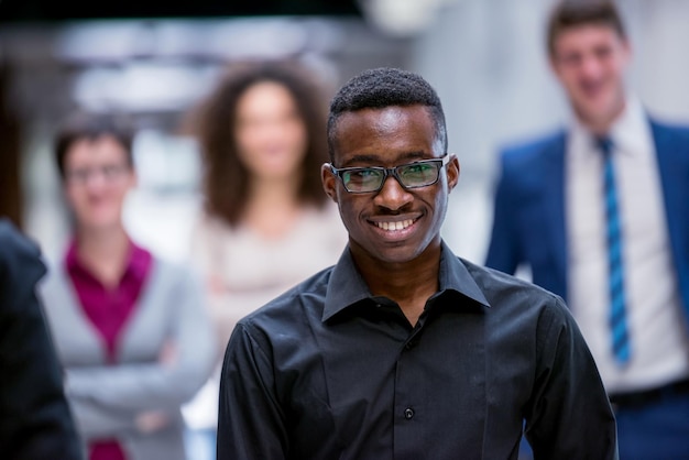 Photo young multi ethnic business people group walking standing and top view