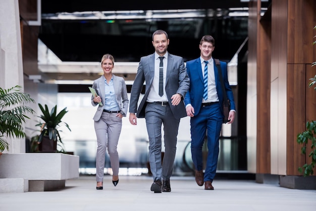 young multi ethnic business people group walking standing and top view