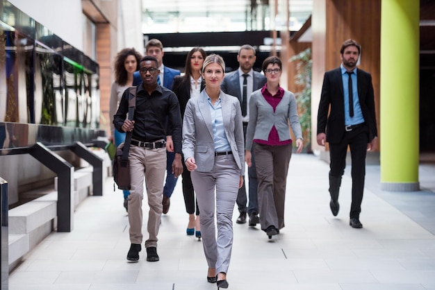 young multi ethnic business people group walking standing and top view