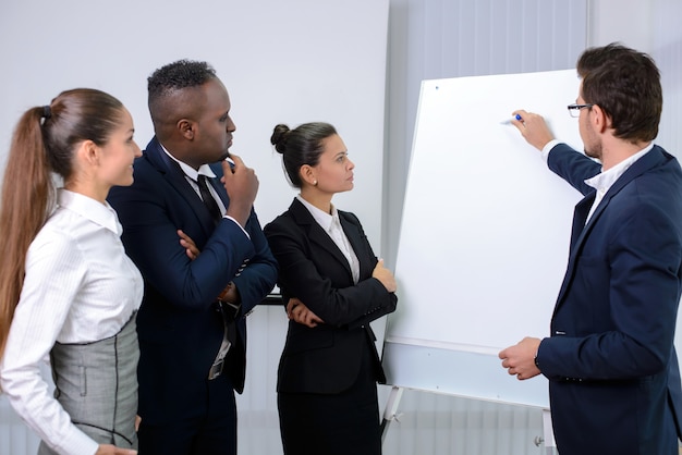 Young multiethnic business team planning a new strategy.