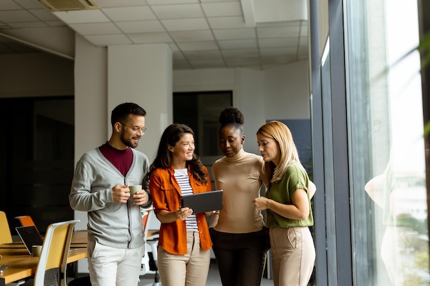 Young multiethnic startup team working in the modern office