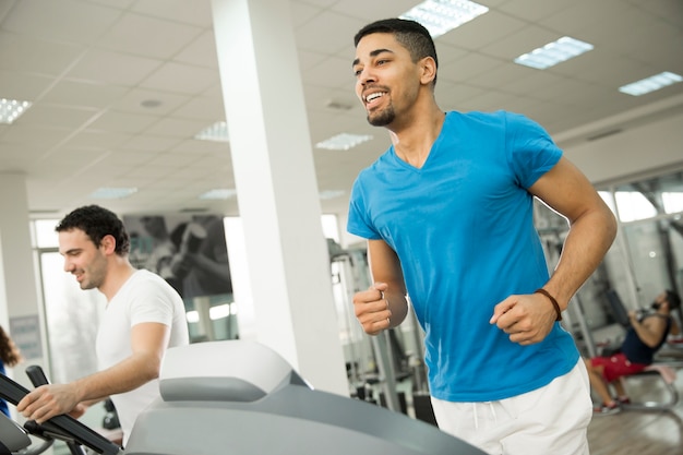 Young multiracial men in the gym