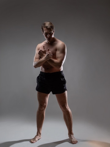 Premium Photo | Young muscular man in an expressive pose artistic pose of  the hero with outstretched arms beautiful