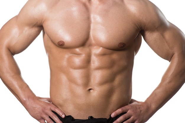 Young Muscular Man Posing In Studio Showing Abs  Isolated On White Background