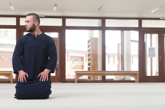 Young Muslim Guy Praying