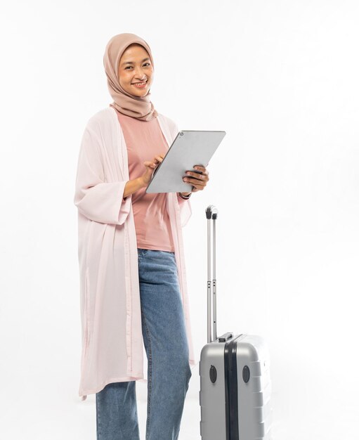 Young muslim woman ready for vacation during eid mubarak holiday