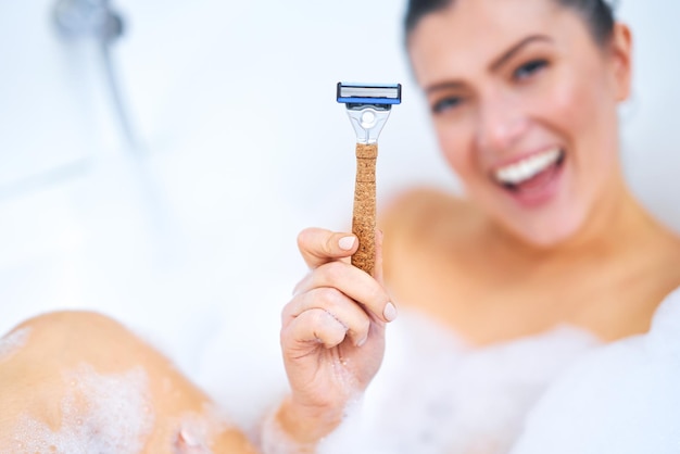 Young nice brunette woman having bath in bathtub High quality photo