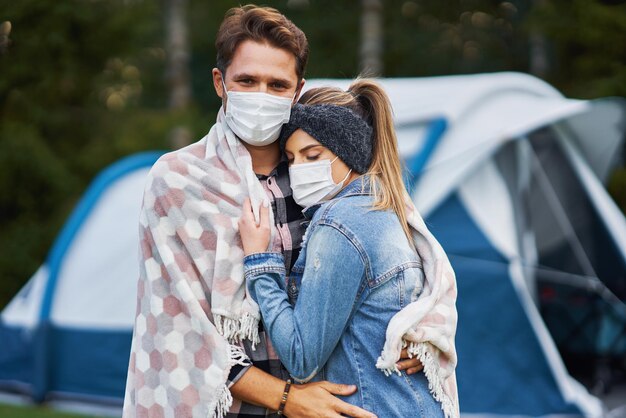 Young nice couple having fun on camping. High quality photo