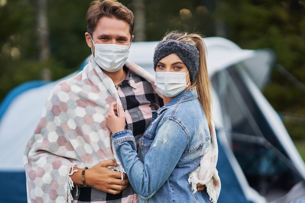 Young nice couple having fun on camping. High quality photo