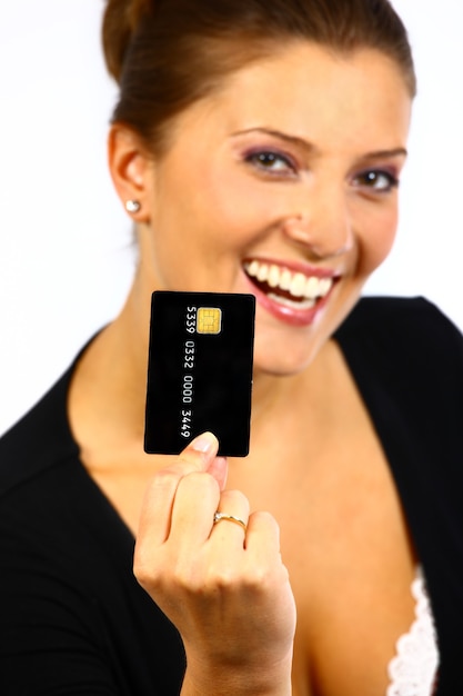 Photo young nice woman holding black credit card