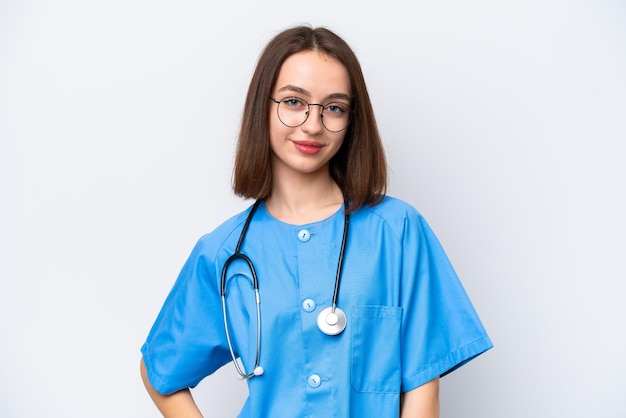 Young nurse Ukrainian woman isolated on white background laughing