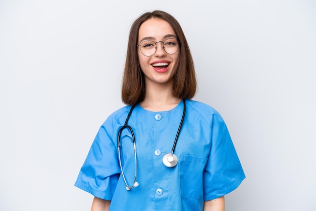 Young nurse Ukrainian woman isolated on white background with surprise facial expression