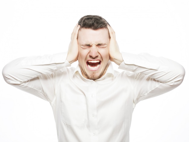 Young office worker mad by stress screaming