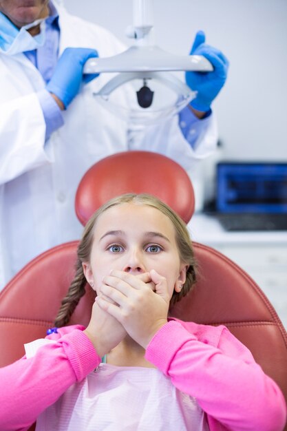 Young patient scared during a dental check-up