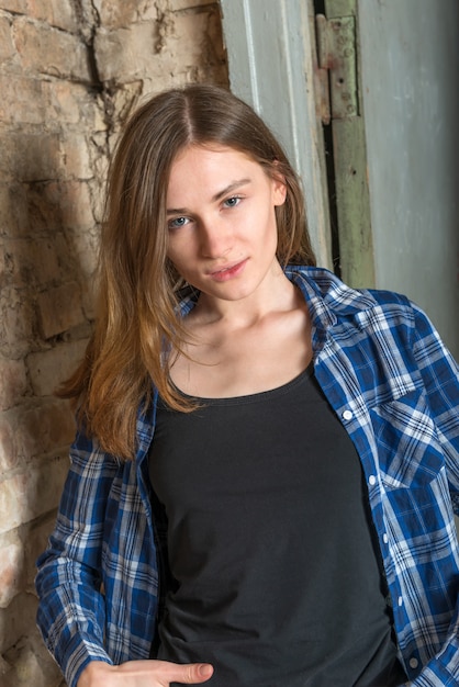 Young pensive brown-haired girl 