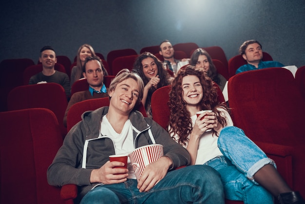 Young people are watching comedy in cinema