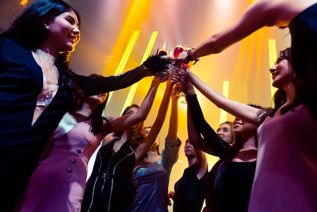 Young people celebrating a party, drink and dance