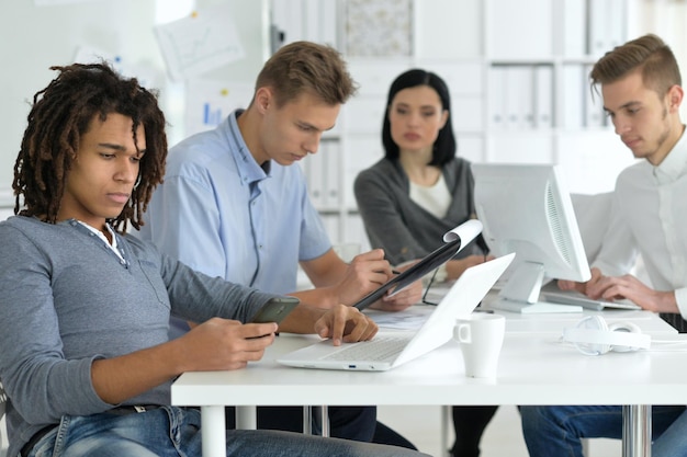 young people colleagues at office
