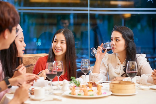 Young people eating and talking