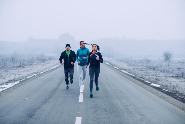 Young people jogging outdoors