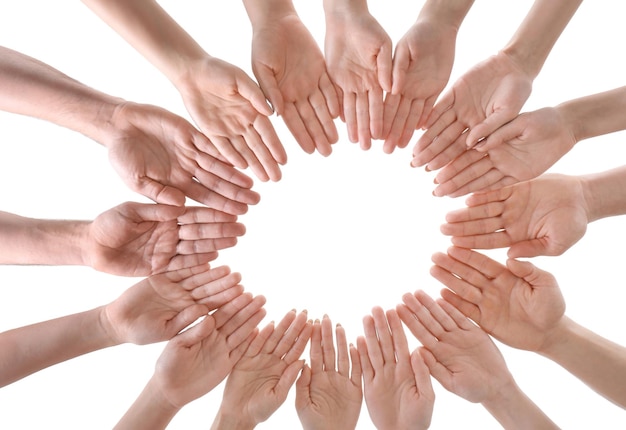 Photo young people making circle with their hands as symbol of unity on white background