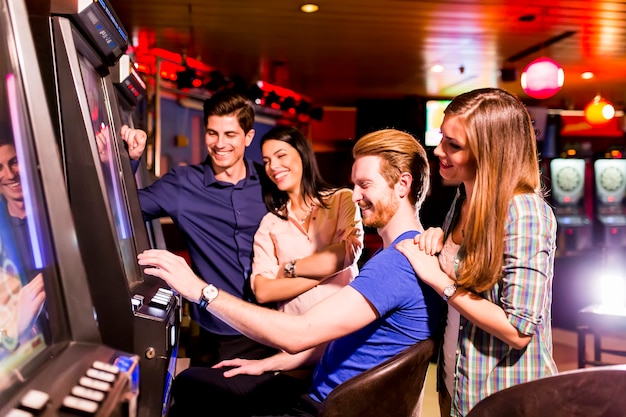 Young people play jackpot in the casino