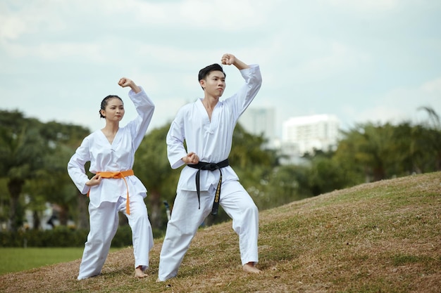 Young people practicing taekwondo