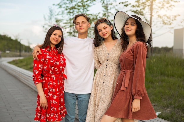 young people in the summer in the park for a walk