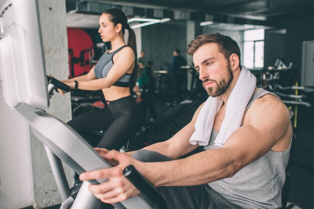 young people training on the exercise bike