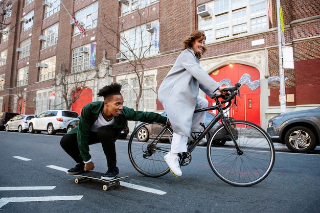 Photo young people using sustainable mobility