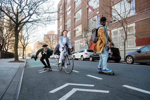 Photo young people using sustainable mobility