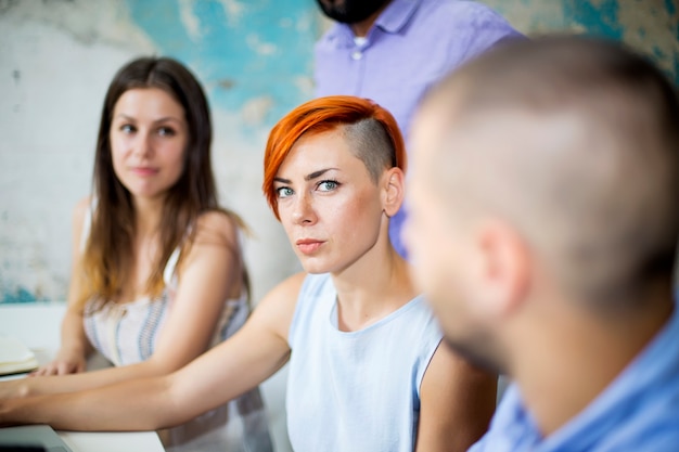 Young people working in the grunge office