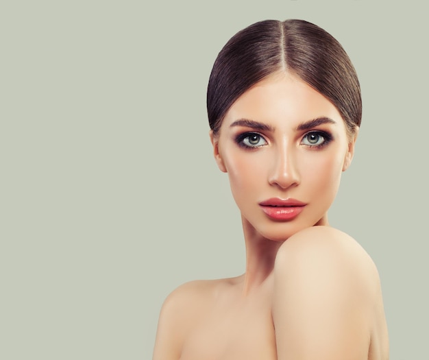 Young perfect woman portrait Beautiful female face Cosmetology beauty and skincare concept