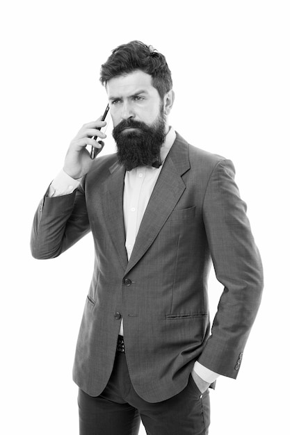 Young perfectionist man speak on phone business communication Agile business mature man success deal Business talk bearded businessman in suit Always available Talking business details