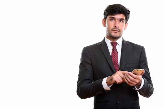 young Persian businessman using mobile phone