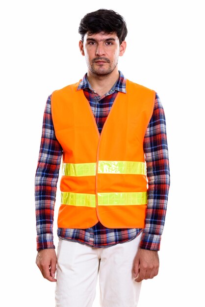 young Persian construction worker standing