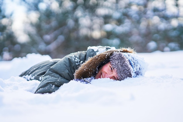 Young person having fun on the snow. High quality photo