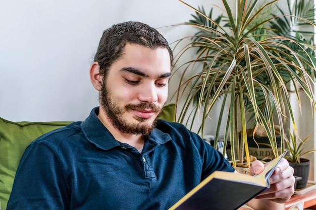 Young person reading relaxing after hardworking day