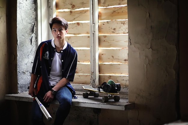 A young person with a baseball bat