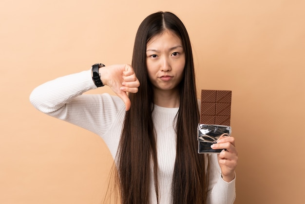 Young person with food over isolated background