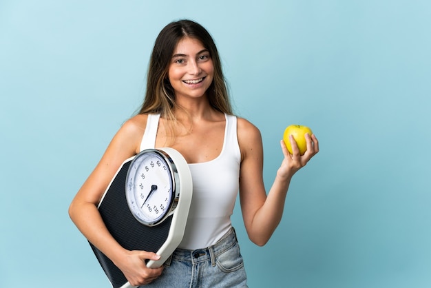 Young person with food over isolated background