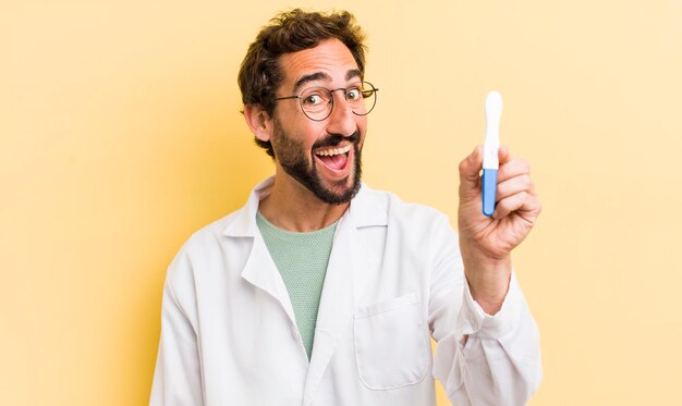 Young physician with a positive pregnancy test