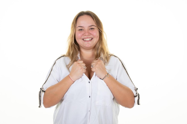 Young plus size woman in casual white shirt proud hands holding blouse collar blonde girl on white background studio