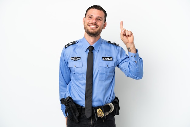 Young police Brazilian man isolated  on white background pointing up a great idea