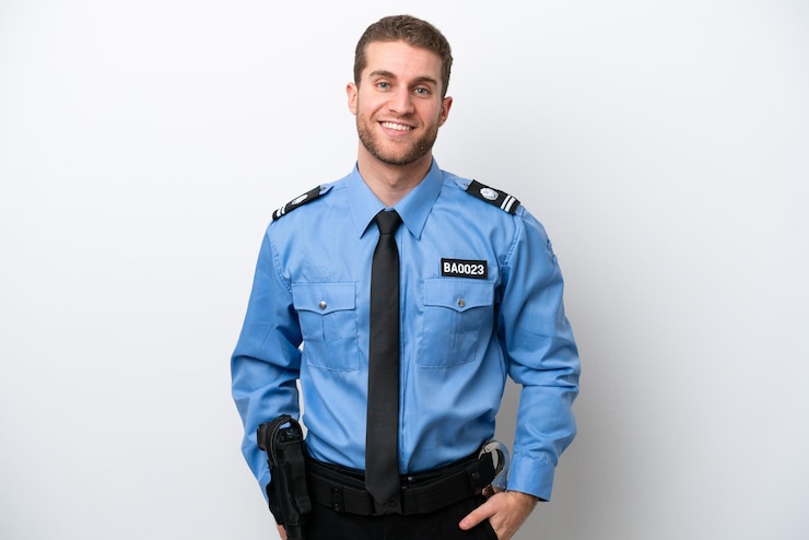 Photo young police caucasian man isolated on white background laughing
