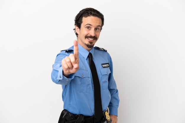 Photo young police man over isolated background white showing and lifting a finger