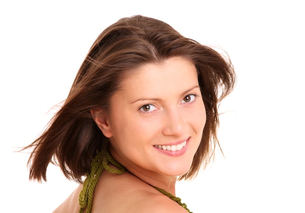 a young positive woman smiling over white