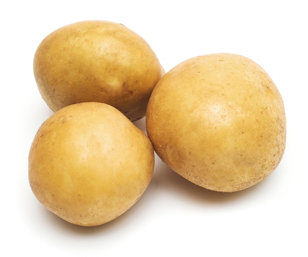 Young potatoes isolated on white background. Harvest new. Flat lay, top view