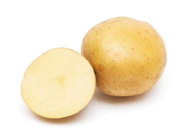 Young potatoes whole and slice isolated on white background. Harvest new. Flat lay, top view